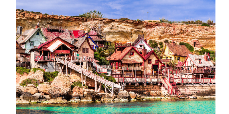 The colourful wooden houses of Popeye Village - 5 Day Malta Itinerary The colourful wooden houses of Popeye Village - 5 Day Malta Itinerary